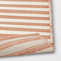 7'x10' Narrow Wornstripe Rectangular Woven Outdoor Area Rug Coral Orange - Threshold™ -Threshold Outdoor Deals Store GUEST 25e56bbe db53 43e9 807e 1d35d9996e1a