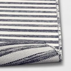 7'x10' Narrow Wornstripe Rectangular Woven Outdoor Area Rug Navy Blue - Threshold™ -Threshold Outdoor Deals Store GUEST 899b548d f416 4892 bc7a 3d8cdcf92d5b