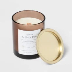 Clear Colored Glass With Woodwick And Brass Metal Inset Lid Acorn + Black Pine Candle Brown - Threshold™ -Threshold Outdoor Deals Store GUEST e82cdb94 c293 4984 b5b6 1ca170680739